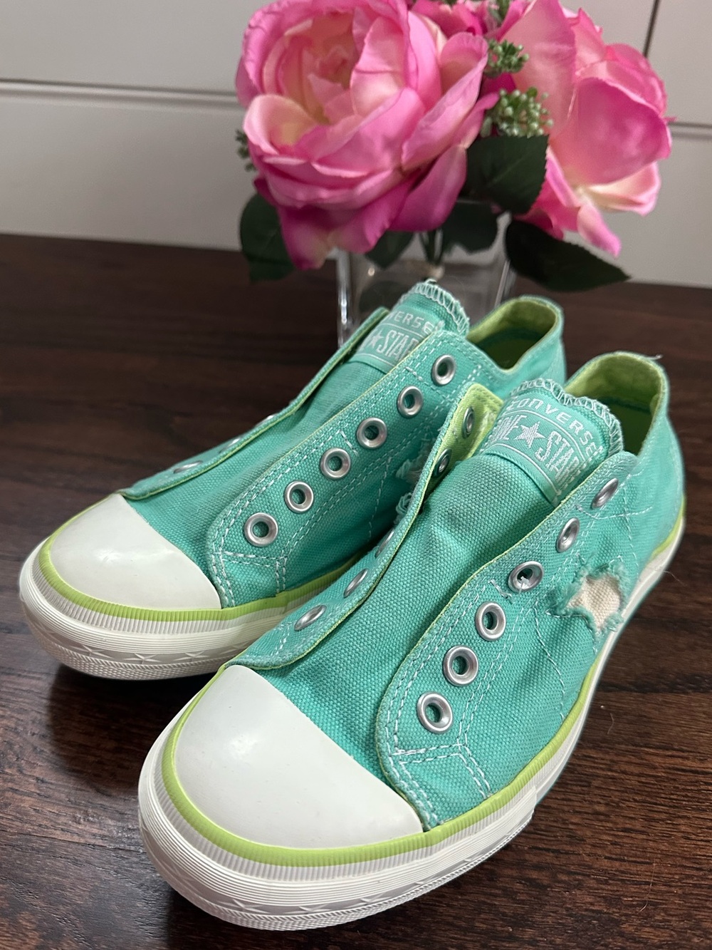 Converse All Stars slip on sneakers, size 7
